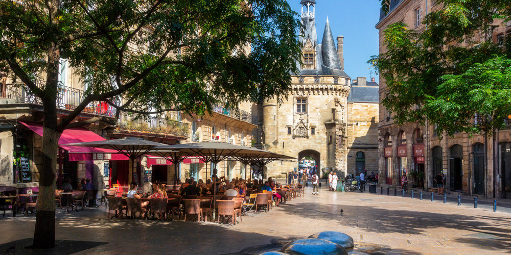 Off a pleasant plaza in Bordeaux is a gate in the shape of a small castle in the wall surrounding the medieval city