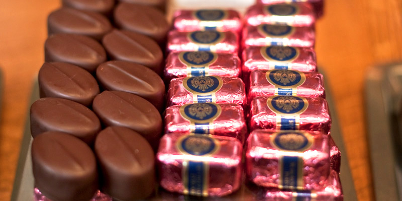 A tray of chcolate candies in a Paris store