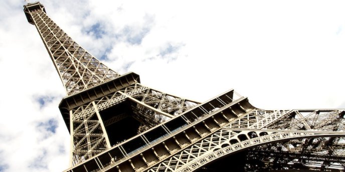 Looking up at the majestic Eiffel Tower in Paris