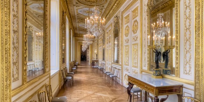 Golden hallway connecting the salons, photo by Mark Craft