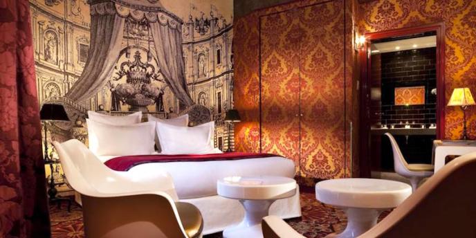 Extravagent design of a room at Hotel du Petit Moulin In The Marais