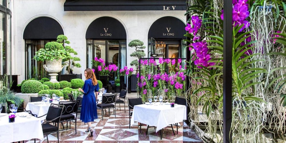 Outdoor dining at restaurant Le V at the George V Hotel in Paris