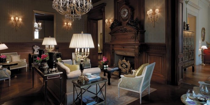 The dark tones of the elegant lobby at Shangri-La Hotel