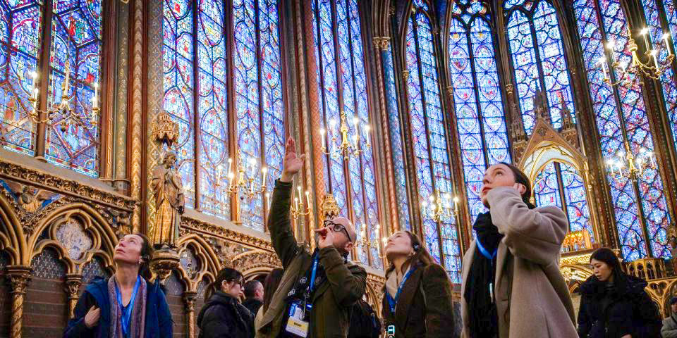 Visitors Admiring the stained glass of La Sainte Chapelle