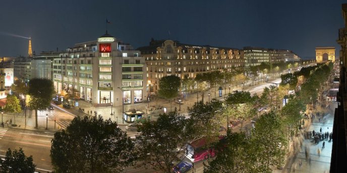 Louis Vuitton flagship store dominates a corner of Champs-Elysees in Paris