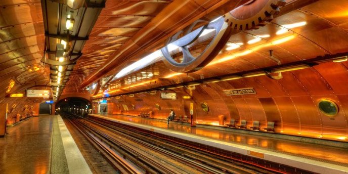 The dramatic Arts et Metiers Metro station uses a steampunk theme