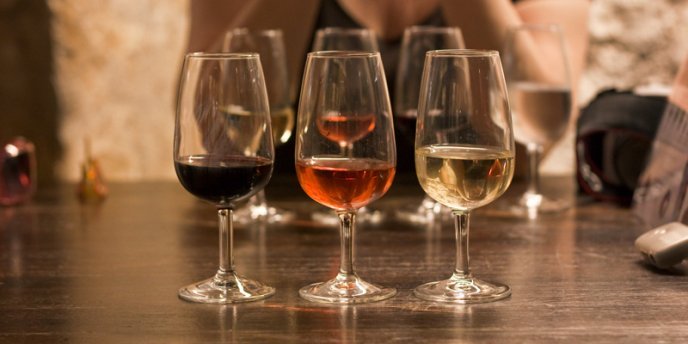 Wine glasses lined up during a tasting at Musee du Vin, Paris