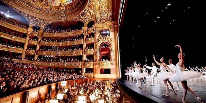 Dancers perform on stage during a ballet at Palais Garnier in Paris