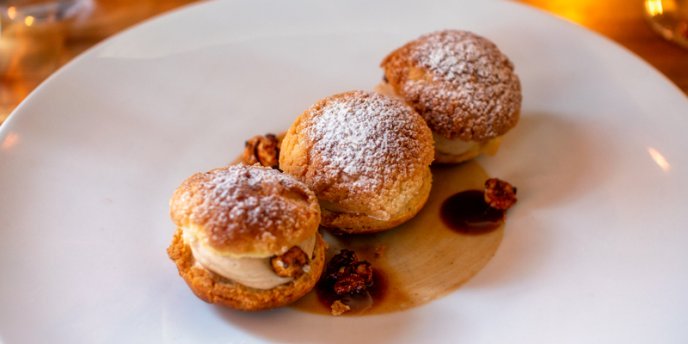 Three small pastries served for dessert at Restaurant Escudella, photo by Mark Craft