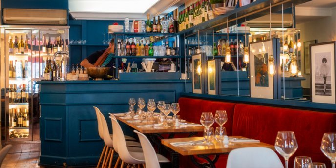 Blue and red colors bring a hint of the south to Restaurant Escudella