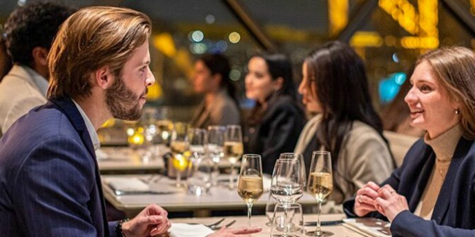 Couples having lunch at the Eiffel Tower at Madame Brasserie in Paris