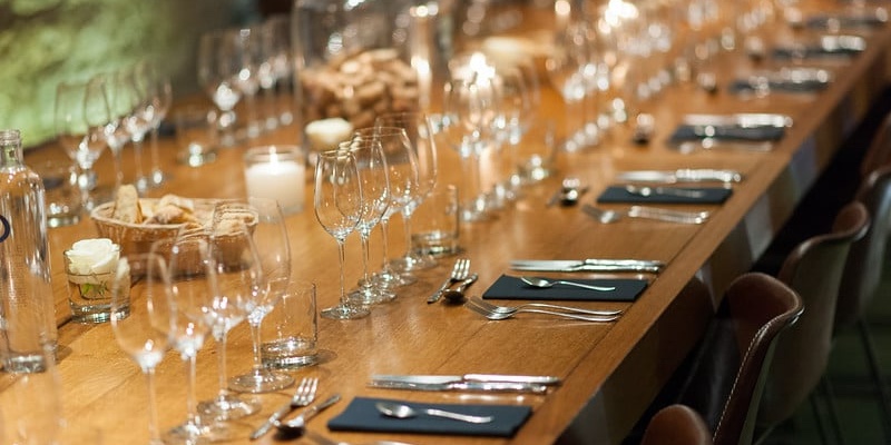 A cellar table in Paris set for a group wine tasting