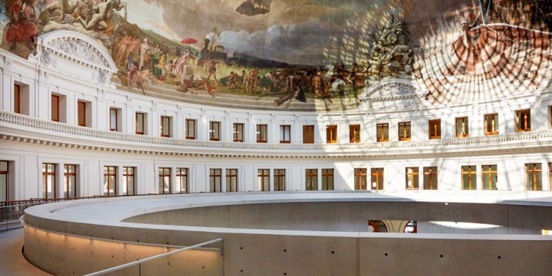 The rotunda at Bourse de Commerce Paris featuring a wrap-around mural