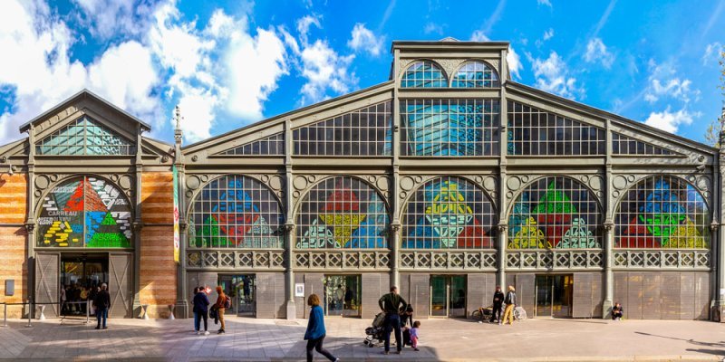 The facade of the 19th century Carreau du Temple in the Marais, which hosts the Paris Rare Book Fair