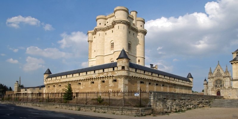 A wide view of the Chateau de Vincennes with La Sainte Chapelle to the right