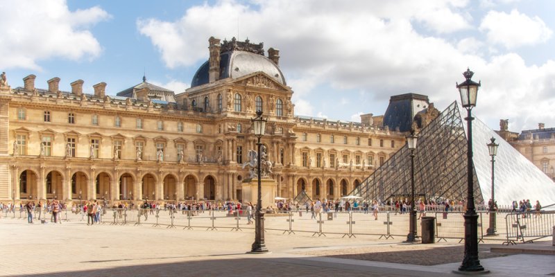 The courtyard and pyramids of the Louvre in Paris