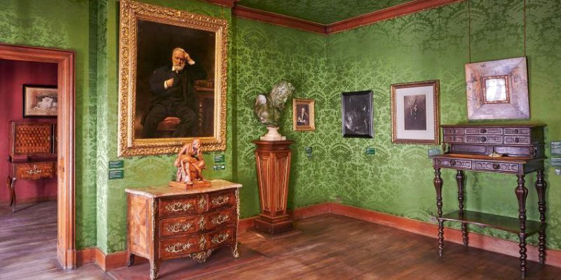 The writing room, or study, at Maison Victor Hugo showing his tall, stand-up desk