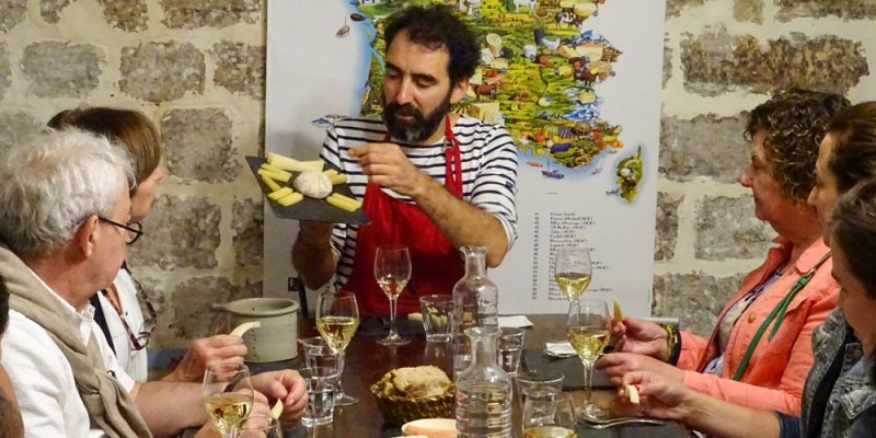 Cheese demonstration with wine tasting at Musée du Fromage