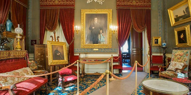 A sitting room with period furniture at the Pasteur Museum Paris