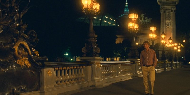 Pont Alexandre III with Owen Wilson in a nighttime scene from Midnight in Paris