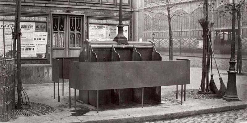 An old-fashioned Paris pissoir in a black and white vinage photo