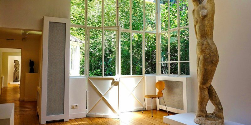 Light streaming into the studio of the Zadkine Museum Paris with a view of the garden