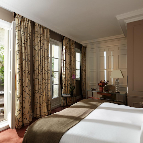 A room incalming netural tones at Le Burgundy Hotel Paris