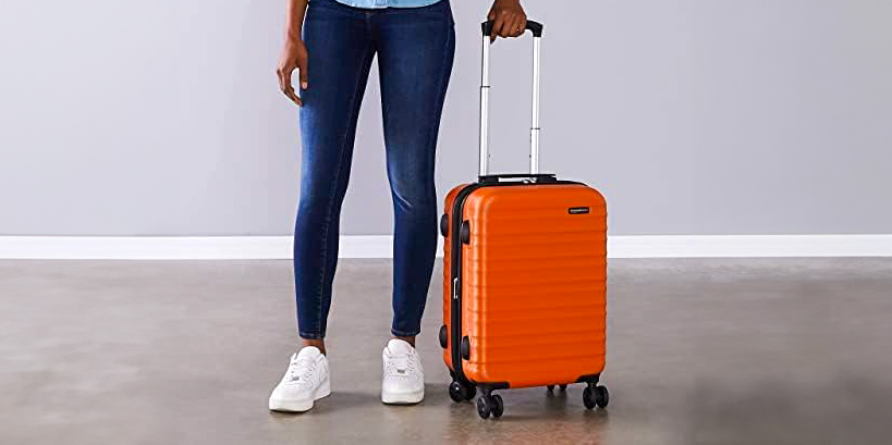 Orange carry-on packing luggage from Amazon