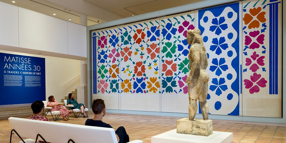 At the Matisse Museum in Nice visitors gaze on a large mural