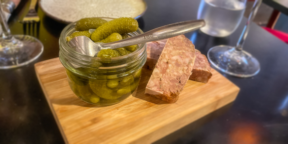 Pork terrine, cornichons, and crisp, dark bread at La Regalade Saint-Honore in Paris